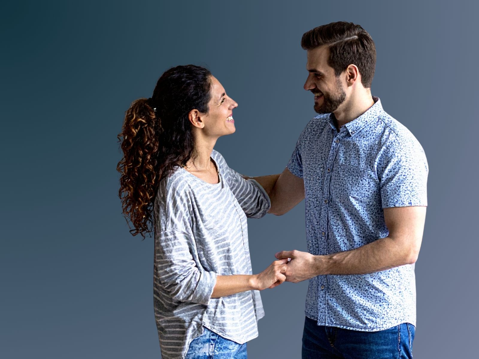 Expat couple reviewing their cross-border financial plan together