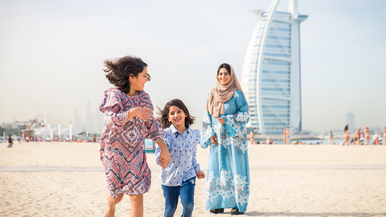 The iconic Burj Al Arab standing tall in the background symbolizing how Dubai blends luxury and desert heritage